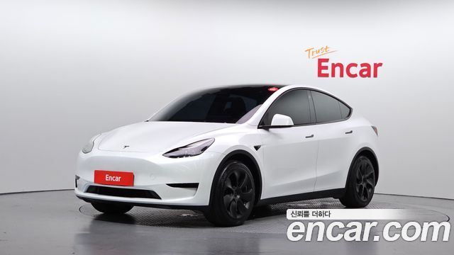 Tesla Model Y 2023 — photo 1