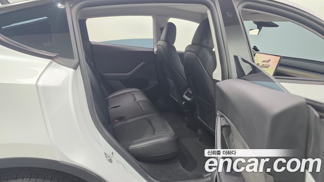 Tesla Model Y 2023 — photo 17