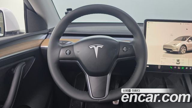 Tesla Model Y 2023 — photo 21