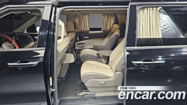 Kia Canival 2021 — photo 17