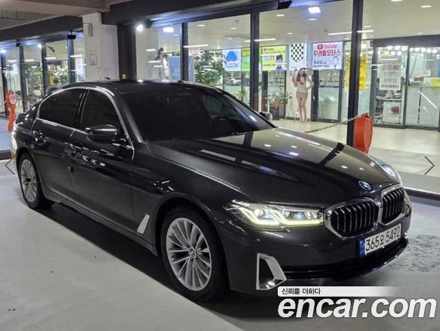 BMW 5-Series 2021 — photo 1