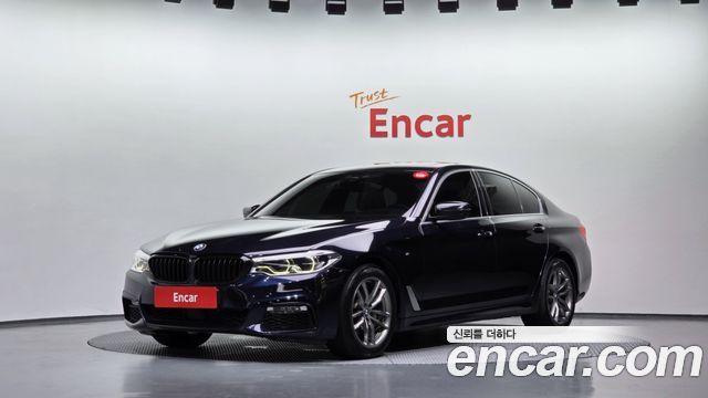 BMW 5-Series 2018 — photo 1