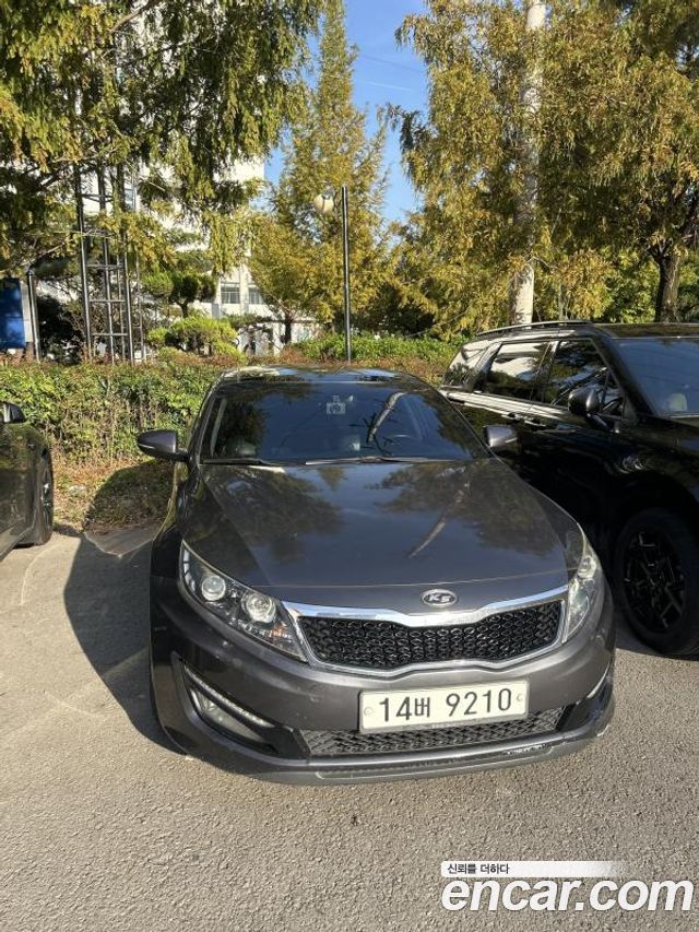 Kia K5 2011 — photo 1