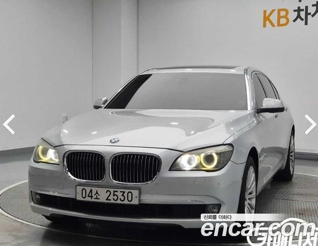 BMW 7-Series 2011 — photo 1