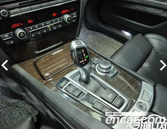 BMW 7-Series 2011 — photo 8