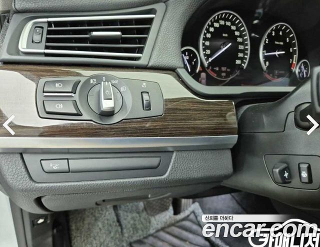 BMW 7-Series 2011 — photo 18