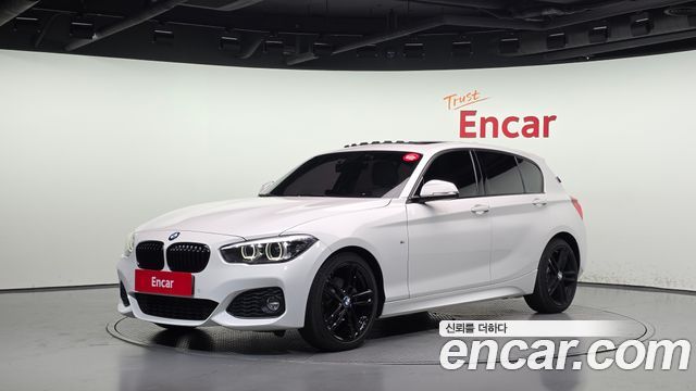 BMW 1-Series 2018 — photo 1