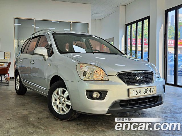 Kia Carens 2011 — photo 1