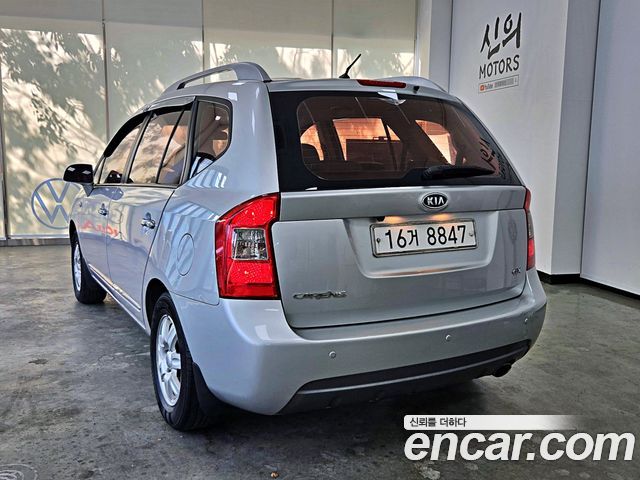 Kia Carens 2011 — photo 2