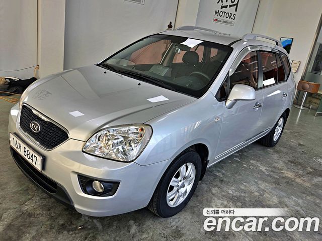 Kia Carens 2011 — photo 3