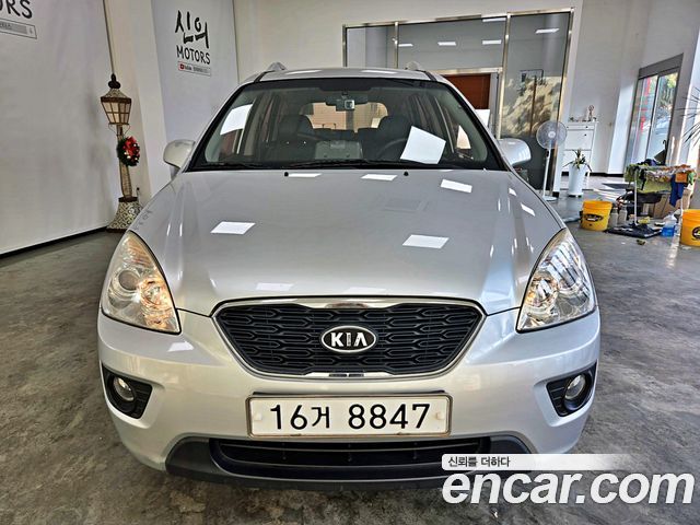Kia Carens 2011 — photo 4