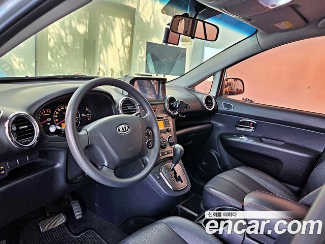 Kia Carens 2011 — photo 9