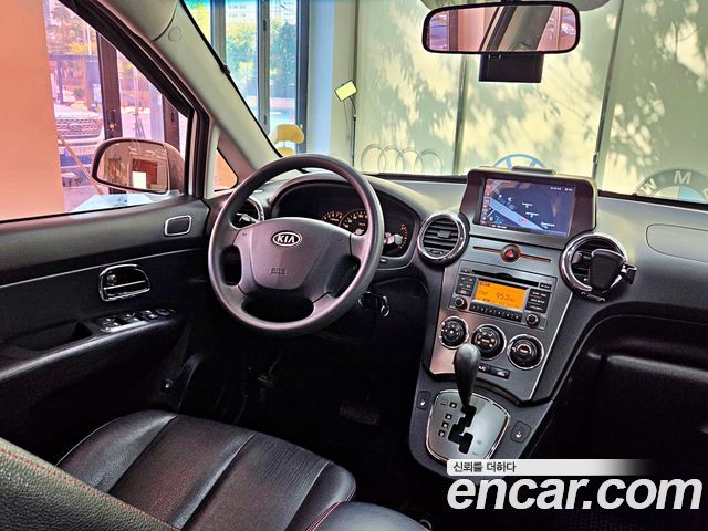 Kia Carens 2011 — photo 12