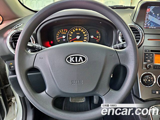 Kia Carens 2011 — photo 13