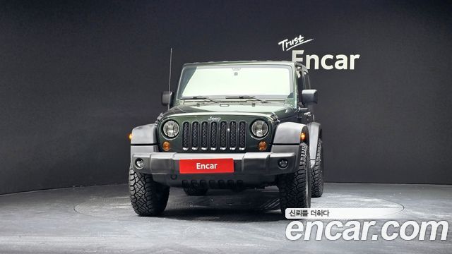 Jeep Wrangler 2010 — photo 3