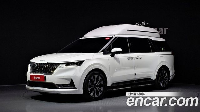 Kia Canival 2023 — photo 1