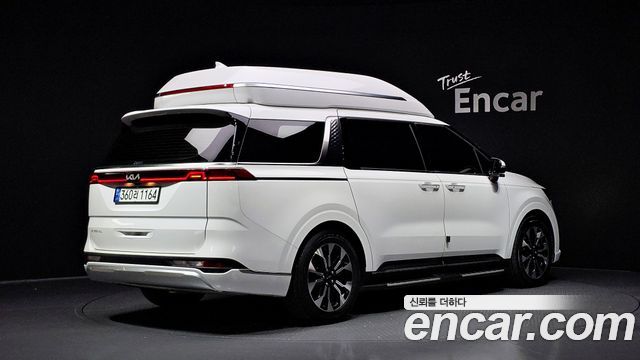Kia Canival 2023 — photo 2