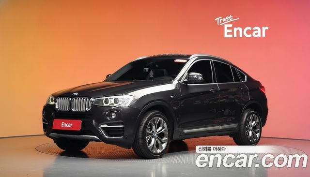 BMW X4 2015 — photo 1