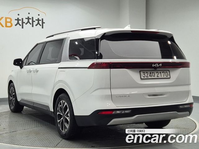 Kia Canival 2023 — photo 2