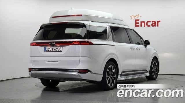 Kia Canival 2023 — photo 2