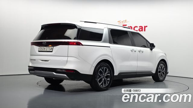 Kia Canival 2021 — photo 2