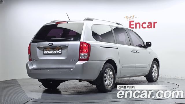 Kia Canival 2013 — photo 2