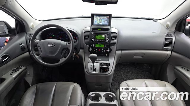 Kia Canival 2013 — photo 10
