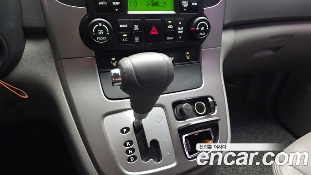 Kia Canival 2013 — photo 12