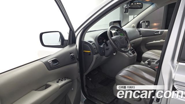 Kia Canival 2013 — photo 13