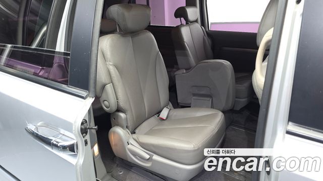 Kia Canival 2013 — photo 17