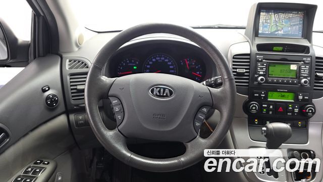 Kia Canival 2013 — photo 19