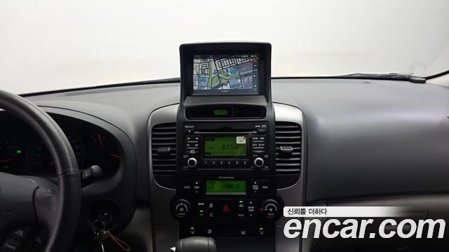 Kia Canival 2013 — photo 20