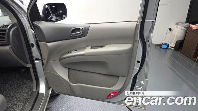 Kia Canival 2013 — photo 15