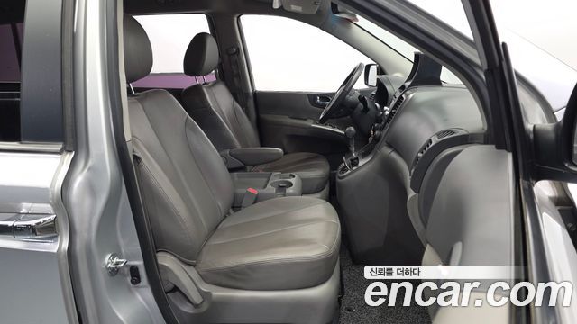 Kia Canival 2013 — photo 16