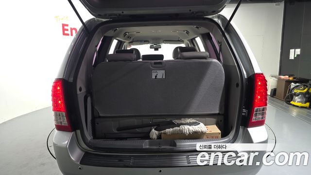 Kia Canival 2013 — photo 31