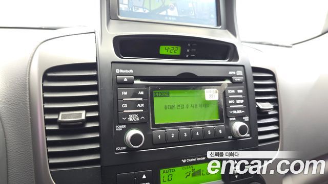 Kia Canival 2013 — photo 32