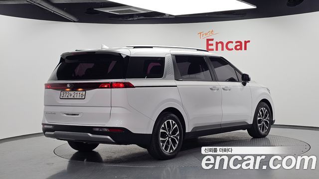 Kia Canival 2021 — photo 2