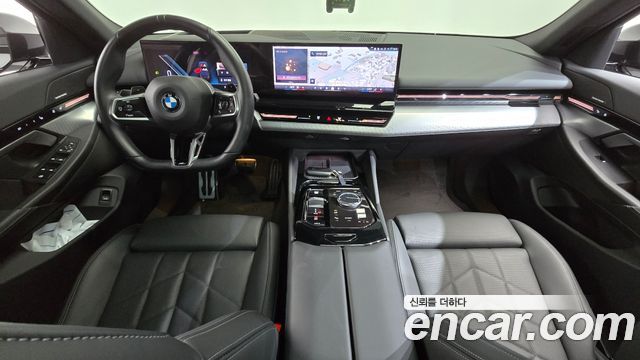 BMW 5-Series 2024 — photo 10