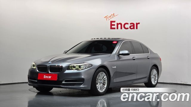 BMW 5-Series 2014 — photo 1