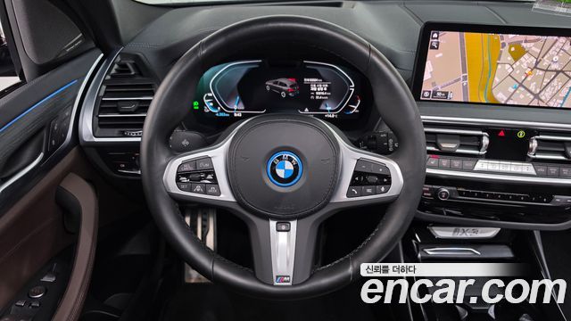 BMW iX3 2023 — photo 18