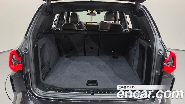 BMW iX3 2023 — photo 26