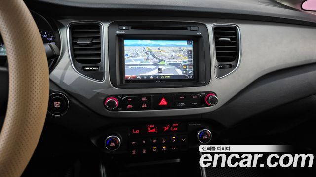 Kia Carens 2015 — photo 20