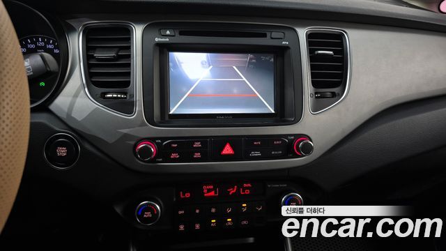 Kia Carens 2015 — photo 22