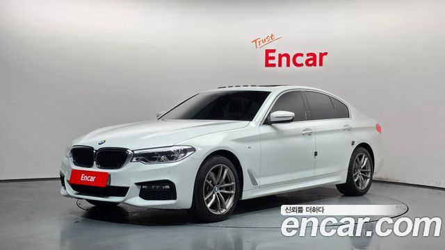 BMW 5-Series 2018 — photo 1