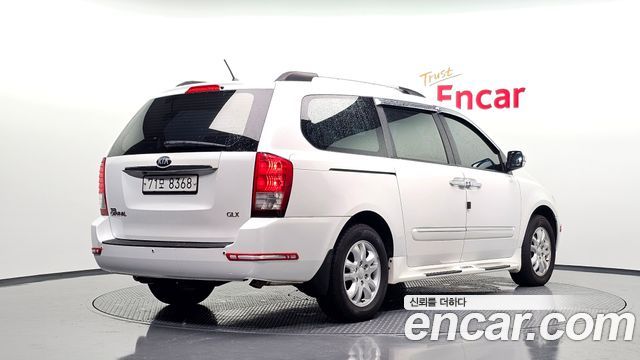Kia Canival 2013 — photo 2