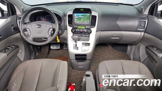 Kia Canival 2013 — photo 10