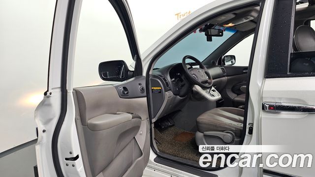 Kia Canival 2013 — photo 13