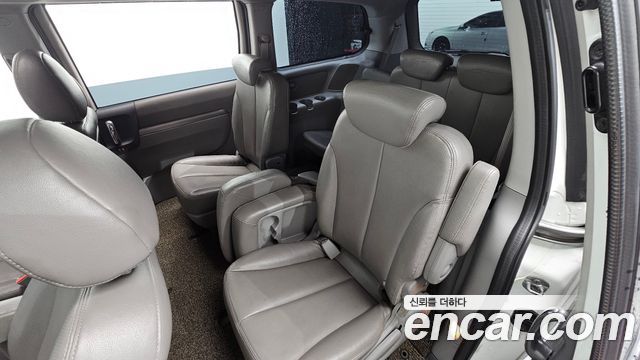 Kia Canival 2013 — photo 17