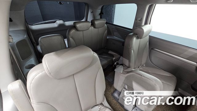 Kia Canival 2013 — photo 18