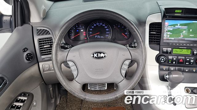 Kia Canival 2013 — photo 22